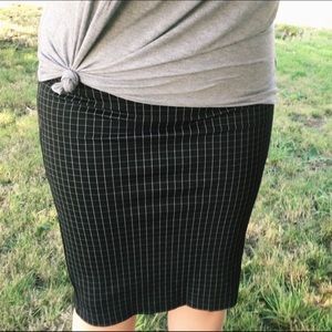 Black knee-length pencil skirt